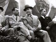 Gheorghe Gheorghiu –Dej, Th. Georgescu, L. Pătrăşcanu, M. Ralea în tribuna oficială, primind demonstraţia oamenilor muncii cu prilejul zilei de 1 Mai 1946 (Piaţa Victoriei). (01.05.1946).