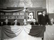 Şedinţă comună în sala cinematografului „Paris” a Comitetelor Centrale a P.C.R. şi P.S.D., în prezenţa candidaţilor comunişti şi social-democraţi, cu privire la sarcinile celor două partide pentru victoria în alegeri a B.P.D.-ului. În prezidiul şedinţei se află: Gh. Gheorghiu–Dej  Şt. Voitec, Lothar Rădăceanu, M. Constantinescu, V. Luca, ş.a. (23.10.1946).