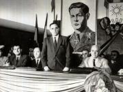 Gh. Gheorghiu–Dej vorbind la conferinţa pe ţară a candidaţilor B.P.D. din sala „Dalles”. În prezidiu se află: Gh. Gh.–Dej,  P. Groza, Th. Georgescu, Gh. Tătărăscu, L. Pătrăşcanu, M. Constantinescu. (24.10.1946).