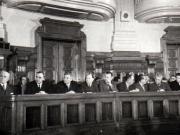 Gh. Gh.-Dej, Petru Groza, Vasile Luca, Teohari Georgescu, Chivu Stoica, Lothar Rădăceanu, Emil Bodnăraş, Iosif Chişinevschi, Gh. Vasilichi, Miron Constantinescu pe banca ministerială participând la cea de a 9-a sesiune ordinară a M.A.N., unde s-a dezbătut proiectul de lege privind planul cincinal de dezvoltare a economiei naţionale. (1951-1955)(14 decembrie 1950).