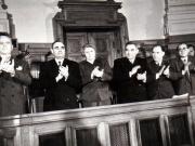 Gh. Gh.-Dej, Petru Groza, Ana Pauker, Vasile Luca, Teohari Georgescu, Iosif Chişinevschi, Avram Bunaciu pe banca ministerială la M.A.N., cu prilejul votării legii Planului Cincinal de dezvoltare a economiei naţionale pe anii 1951-1955. (15 decembrie 1950)