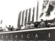 Gh. Gheorghiu-Dej, P. Groza, C.I.Parhon, Gh. Apostol, V. Luca, M. Constantinescu, Leontin Sălăjan, P. Borilă, Th. Georgescu, P. Constantinescu-Iaşi, Al. Moghioroş, ş.a., în tribuna oficială din Piaţa Aviatorilor, cu prilejul demonstraţiei de 1 Mai.(01.05.1952).