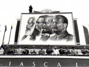 Gh. Gheorghiu-Dej, P. Groza, M. Constantinescu, C. Pârvulescu, Chivu Stoica, C.I.Parhon, V. Vaida, D-tru Petrescu, I. Chişinevschi, P. Borilă, S.I. Kavtaradze, Th. Georgescu, ş.a., în tribuna oficială din Piaţa Aviatorilor, la demonstraţia oamenilor muncii din Capitală, cu prilejul zilei de 1 Mai.(01.05.1952).