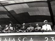 Gh. Gheorghiu-Dej, P. Groza, E. Bodnăraş, V.V. Kuzneţov (conducătorul delegaţiei sovietice), Gh. Apostol, Al. Moghioroş, I. Chişinevschi, ş.a., în tribuna oficială la parada militară şi demonstraţia oamenilor muncii din Capitală, cu prilejul zilei de 23 August 1952 (Piaţa Aviatorilor).(23.08.1952).