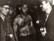 Gheorghe Gheorghiu-Dej printre muncitorii mineri în minele de la Petrila, la 300 m adâncime (1944 noiembrie 23).