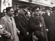 Manifestaţie F.N.D. cu prilejul actului festiv de reunire a Nordului Transilvaniei cu România democratică. Aspecte din Piaţa Palatului, în tribună Gheorghe Gheorghiu Dej, Petru Groza, Vasile Luca,  etc.(general Dămăceanu, general Vasiliu Răşcanu, Petre Constantinescu Iaşi, Teohari Georgescu).(14 martie 1945)