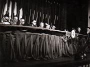 Gheorghe Gheorghiu Dej şi alte persoane în prezidiul Conferinţei Naţionale  a P.C.R., care şi-a desfăşurat lucrările în aula liceului, ”Mihai Viteazul” din Bucureşti (Vasile Luca, Constantin Pârvulescu, Miron Constantinescu, Teohari Georgescu, Lucreţiu Pătrăşcanu).(17- 21 octombrie1945)