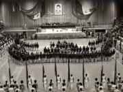Sala Sporturilor şi Culturii din Capitală. Acordarea, de către Nicolae Ceauşescu, a unor înalte ordine şi medalii fruntaşilor sportivi la Jocurile Olimpice de la Montreal – 1976. Conferirea titlului de „Erou al Muncii Socialiste” şi Medalia de aur „Secera şi Ciocanul”, gimnastei Nadia Comăneci. (19 august 1976)